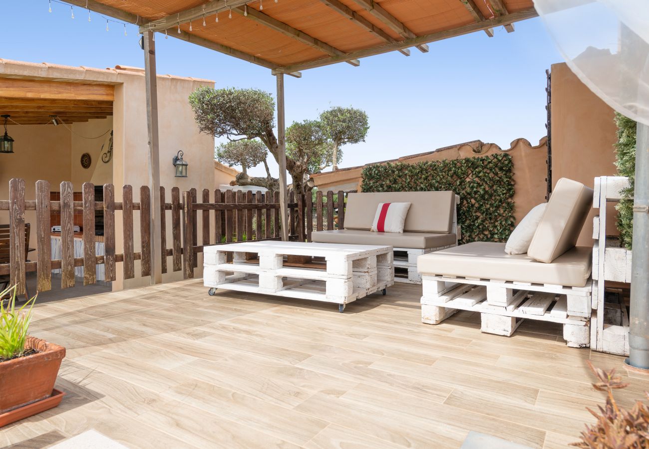 Country house in Llubi - Sunset Finca Son Sitges - Finca with fenced swimming pool, children's playground and barbecue area